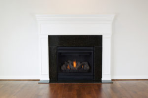 Image of a fireplace with gas logs