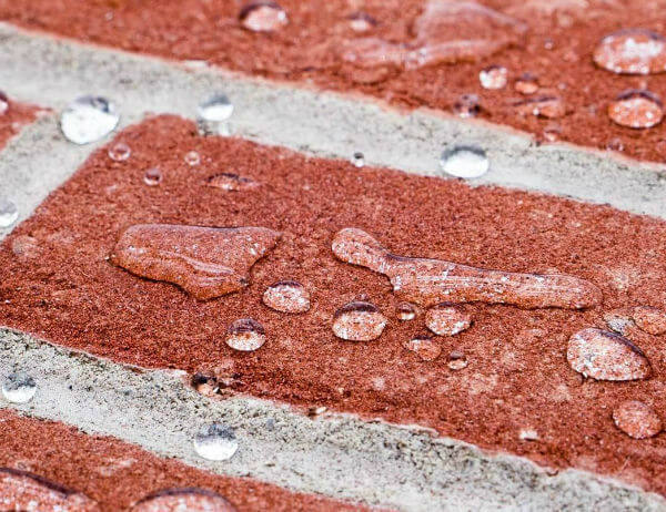 Bricks repelling water after applying Chimney Saver