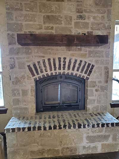 Napoleon insert after insert installed-stone surround and hearth