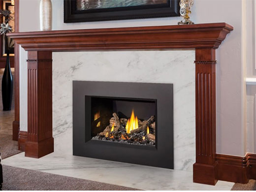 Napoleon Oakville GDiX3 Gas Fireplace Insert with marble surround and beautiful mantel